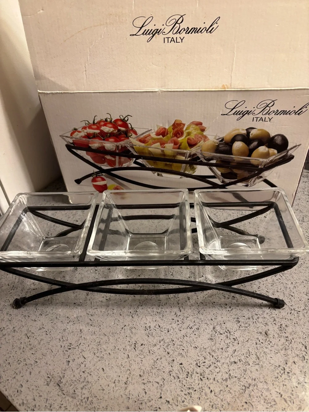 Bormioli Luigi Bormioli Italy iron stand with serving dishes.